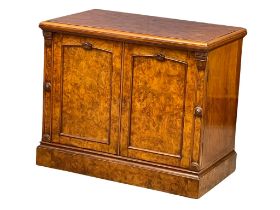 A Victorian Burr Walnut double door side cabinet with Rosette mouldings and interior shelf. 91.