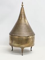 A large early 20th century Moroccan brass Tajine dish with cover. 34x69cm