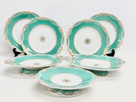7 pieces of Victorian gilt rimmed opaque porcelain dinnerware. 3 comports and 4 dinner plates