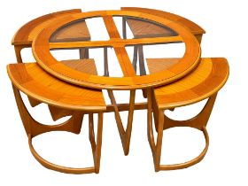 A G-Plan Mid Century teak Astro Trinity coffee table with 4 nesting tables. Designed by Victor