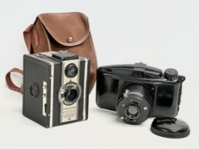 2 vintage cameras. Photax Boyer etc.