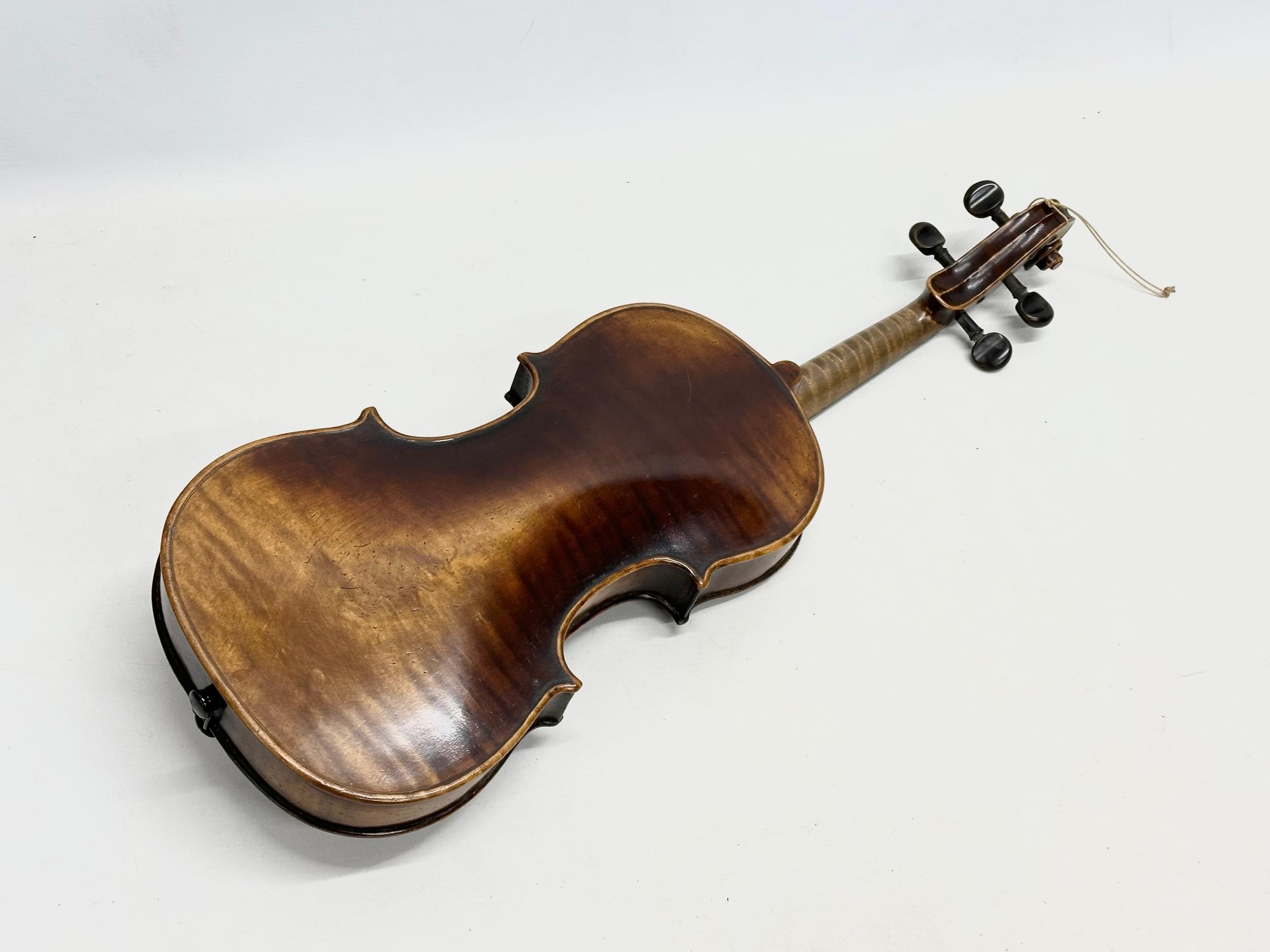 A late 19th/early 20th century violin with case. - Image 4 of 4