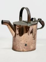 An Edwardian copper watering can. 32x14x30cm