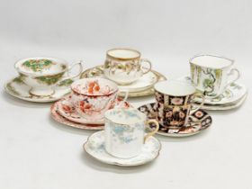 A collection of cups and saucers. A Birks Rawlings & Co Imari cup and saucer. A Doulton Burslem ‘