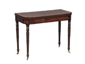 A George IV mahogany and rosewood games table, circa 1820s. 92cm x 46cm x 73cm closed