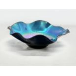 An Okra iridescent ‘Ripple Bowl’ designed by Richard Golding. 1993. Number 57. 26x8.5cm