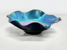 An Okra iridescent ‘Ripple Bowl’ designed by Richard Golding. 1993. Number 57. 26x8.5cm