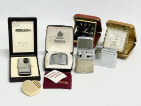 A collection of lighters and clocks. 2 Ronson. 1 possibly by Omega. 1 Zippo.