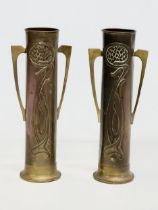 A pair of early 20th century Art Nouveau copper and brass vases by Beldray. 31cm