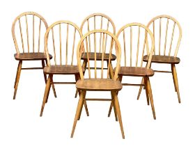 A set of 6 Ercol Mid Century blonde Elm dining chairs. Model 370.