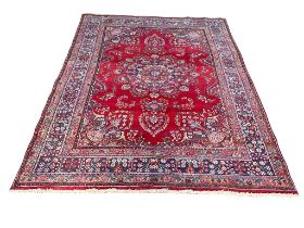 A very large vintage Middle Eastern hand knotted rug. 297x197cm