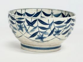 A 20th century Japanese glazed rice bowl. 17x9cm