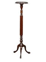 An early 20th century mahogany jardiniere stand. 123cm