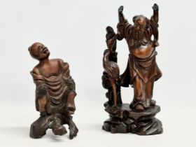 2 19th century Chinese carved boxwood and rosewood figures. 31cm