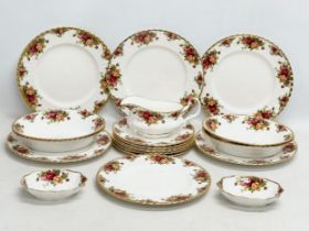 A quantity of Royal Albert ‘Old Country Roses’ dinnerware. 6 dinner plates, 4 salad serving bowls