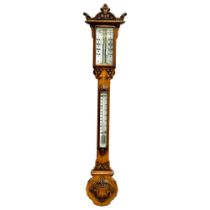 A large Victorian oak stick barometer by F.M. Moore of Belfast and Dublin. 107cm