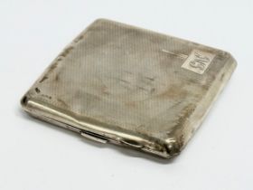 A silver cigarette case. 85 grams.