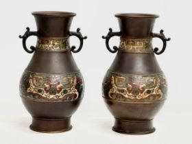 A pair of good quality late 19th century Japanese late Meiji period bronze vases with cloisonné