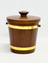 A 1970’s Mid Century teak ice bucket. 23x24cm