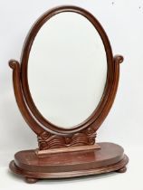 A Victorian mahogany dressing mirror. 60x28x77cm