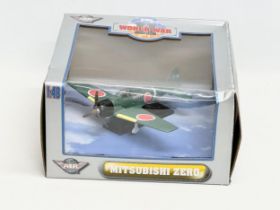 An Air Signature World War II Series die cast metal Mitsubishi Zero model plane with box. 26x26x15cm
