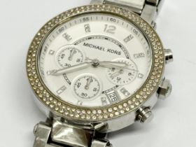 A Michael Kors watch. MK5353
