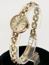 A vintage ladies 9K gold watch. 8 grams of gold.