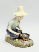 A Royal Doulton ‘River Boy’ figurine. HN2128. 9x10.5cm