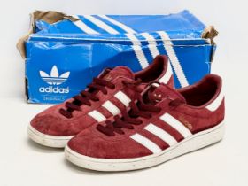 A pair of Adidas Originals ‘Munchen’ trainers. Size UK 8.