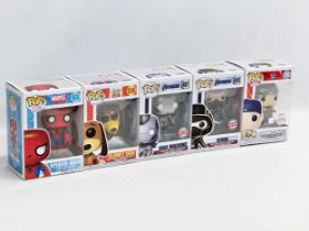 5 POP dolls with boxes.
