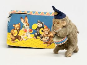 A 1950’s Max Carl windup monkey drummer. Made in West Germany