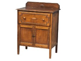A vintage oak record cabinet. 63.5x42x85cm