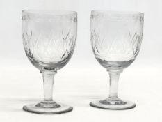 A pair of Victorian etched glass wine goblets. Circa 1840-1860. 8x14.5cm