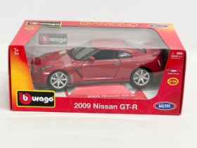 A Burago Diamond Collection 2009 Nissan GT-R model car with box. 30cm.