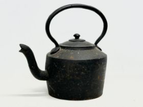 A large Victorian style cast iron kettle. 34x22x33cm
