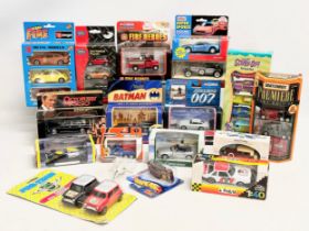 A collection of models cars with boxes. Corgi, Matchbox, Chad Valley, Burago etc.