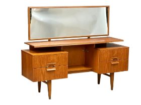 A Mid Century teak dressing table. 153x43x123