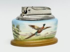 A Mintons bone china table lighter signed A. Holland. By Ronson.