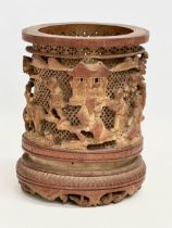 A late 19th century Chinese brush pot. 15x17cm