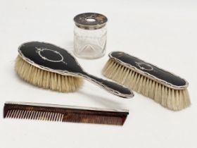 A 4 piece silver and faux tortoise shell vanity set. Birmingham.