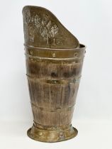 A large late 19th century French oak brass bound Grape Hod/stickstand. 30x65cm