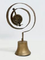 A Victorian brass shops bell/servants bell. 28cm