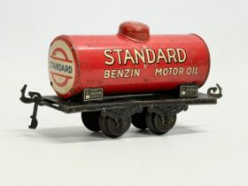 A vintage Trix tinplate Standard Benzin Motir Oil train carriage. Made in Bavaria. 1930’s-1940’s.