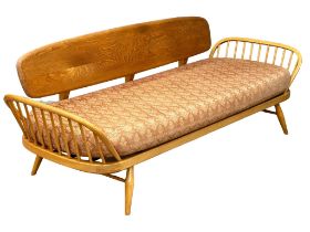 An Ercol Mid Century blonde elm Studio Daybed. Model 355. 207cm