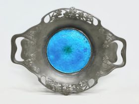 A Liberty & Co Arts & Crafts pewter and enamel tray with pierced rim decorated in Irish clover