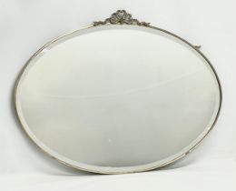 An early 20th century brass framed bevelled mirror. 1900-1920. 76x56cm