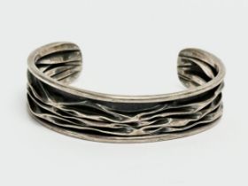 A 925 silver bangle. 21.82 grams. 6.3x5cm