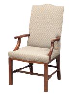 A good quality solid teak Gainsborough style armchair