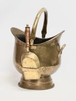 A large early 20th century brass coal scuttle. 32x37x52cm