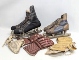 A collection of vintage ice hockey clothing. Including skates.